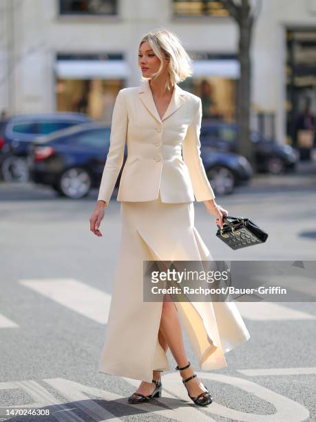 Elsa Hosk is seen heading to the Christian Dior show during Paris Fashion Week on February 28, 2023 in Paris, France.