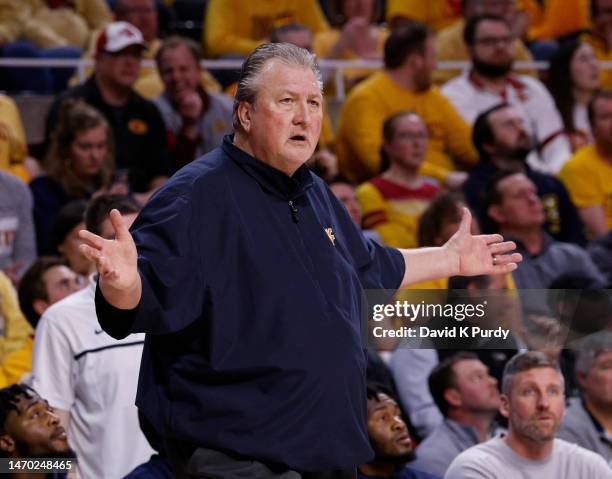 Head coach Bob Huggins of the West Virginia Mountaineers argues a call by an official in the first half of play at Hilton Coliseum on February 27,...