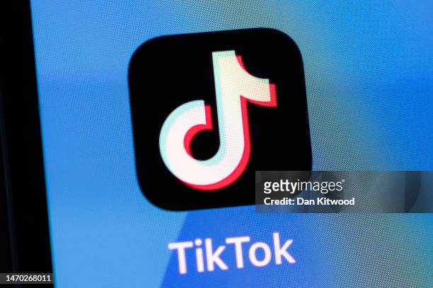 In this photo illustration, the TikTok app logo is displayed on an iPhone on February 28, 2023 in London, England. This week, the US government and...