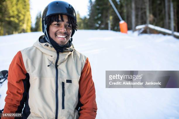 enjoying winter sports - skiing helmet imagens e fotografias de stock
