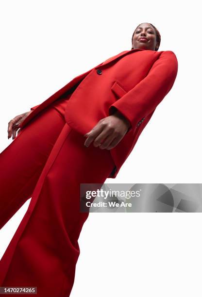 powerful businesswoman - heroic style stockfoto's en -beelden