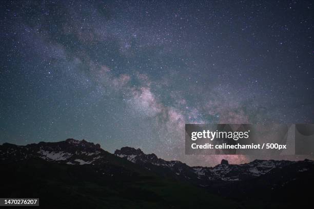 lac de roselend milky way pierra menta,lac de roselend,beaufort,france - storytelling stock pictures, royalty-free photos & images