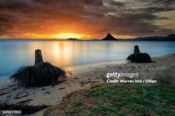 scenic view of sea against sky during sunset,kualoa regional park,united states,usa - クアロア公園 ストックフォトと画像