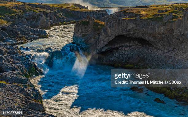 scenic view of waterfall,northeastern,iceland - brook mitchell stock pictures, royalty-free photos & images