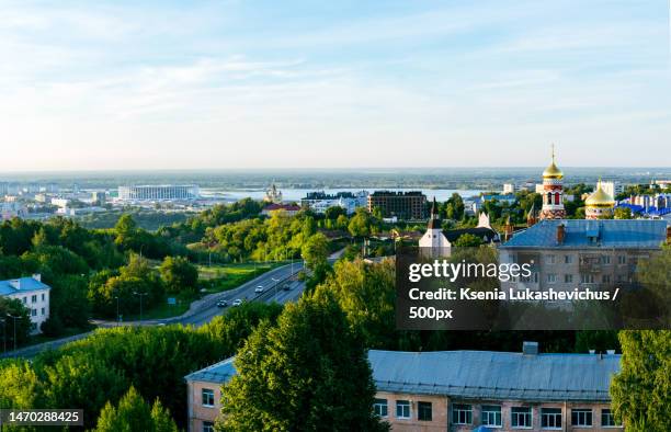 high angle view of townscape by sea against sky,nizhny novgorod,nizhny novgorod oblast,russia - nizhny novgorod stock pictures, royalty-free photos & images