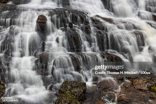 scenic view of waterfall,kambsdalur,denmark - brook mitchell stock pictures, royalty-free photos & images