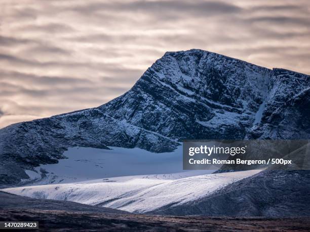 scenic view of snowcapped mountains against sky,kiruna,sweden - zweden stock pictures, royalty-free photos & images