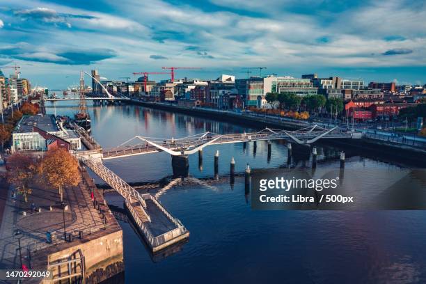 high angle view of bridge over river in city,dublin,ireland - dublin imagens e fotografias de stock