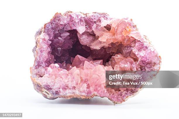 vibrant pink amethyst quartz geode crystal,patagonia argentina,argentina - geode stock-fotos und bilder