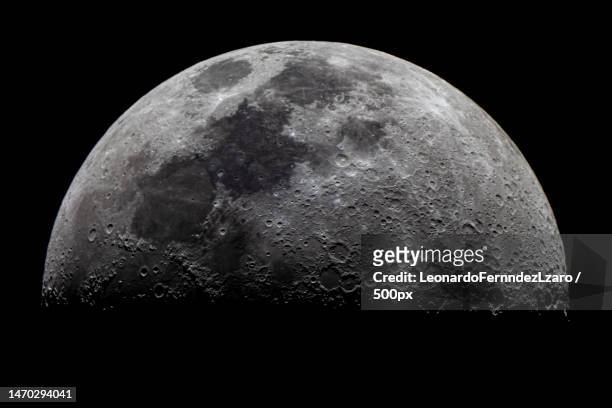 close-up of moon against clear sky at night,guadix,granada,spain - moon photos et images de collection
