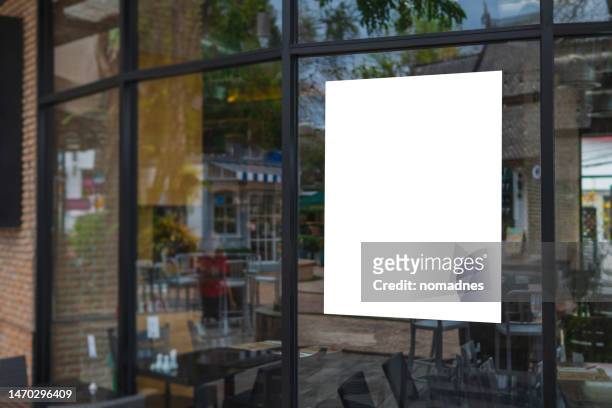 blank poster billboard template. blank sign label and placard attached to the window glass. mockup billboards and various promotions for stores and restaurants. - montra imagens e fotografias de stock