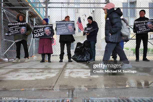 Members of Rise and Resist await the arrival of Steve Bannon, former advisor to President Donald Trump, at NYS Supreme Court on February 28, 2023 in...