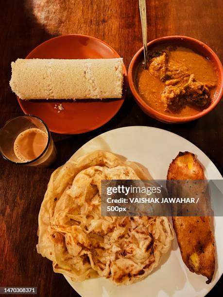 high angle view of food on table,kalpetta,kerala,india - kerala food stock pictures, royalty-free photos & images