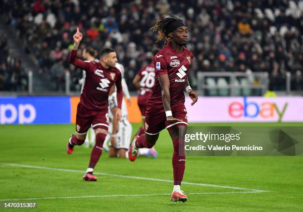 Yann Karamoh of Torino FC celebrates after scoring the team's first goal during the Serie A match between Juventus and Torino FC at Allianz Stadium...