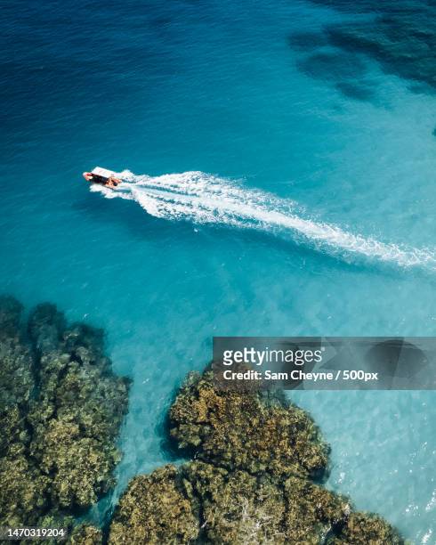 aerial view of boat in sea,reunion - la reunion stock pictures, royalty-free photos & images