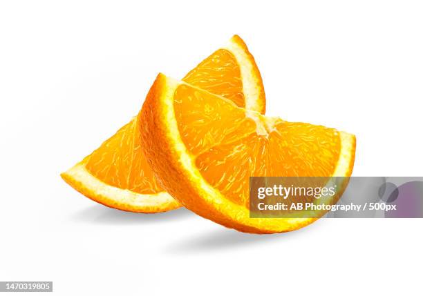 close-up of orange slice against white background,israel - オレンジ ストックフォトと画像