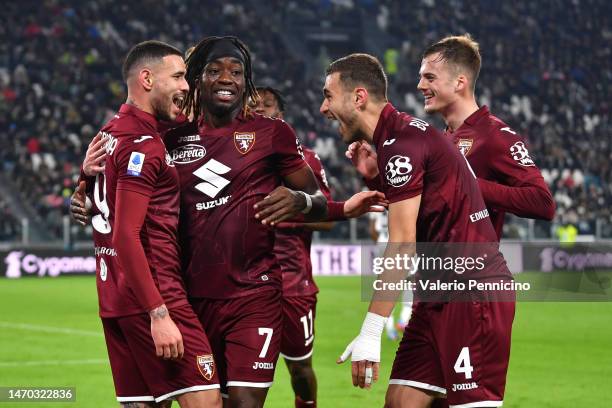 Antonio Sanabria of Torino FC celebrates after scoring the team's second goal with teammates during the Serie A match between Juventus and Torino FC...