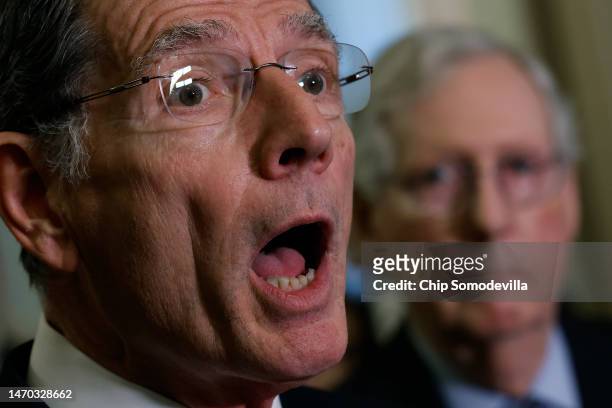 Sen. John Barrasso talks to reporters during a news conference following the weekly Senate Republican policy luncheon at the U.S. Capitol on February...