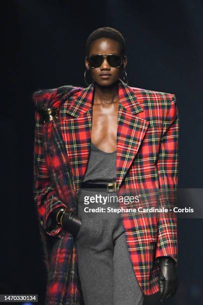 Model walks the runway during the Saint Laurent Womenswear Fall Winter 2023-2024 show as part of Paris Fashion Week on February 28, 2023 in Paris,...
