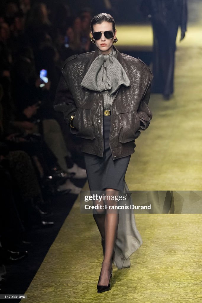 a-model-walks-the-runway-during-the-saint-laurent-womenswear-fall-winter-2023-2024-show-as.jpg