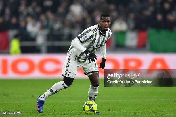 Paul Pogba of Juventus runs with the ball during the Serie A match between Juventus and Torino FC at Allianz Stadium on February 28, 2023 in Turin,...