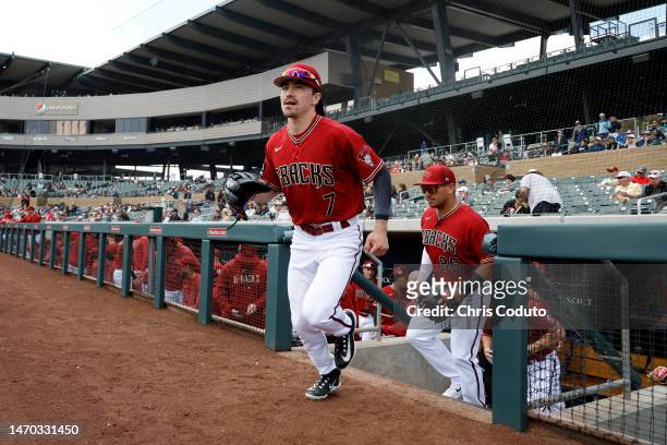 Corbin Carroll of the Arizona Diamondbacks takes the field during the first inning against the Chicago White Sox at Salt River Fields at Talking...