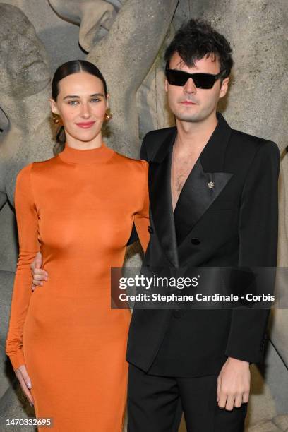 Devon Lee Carlson and Duke Nicholson attends the Saint Laurent Womenswear Fall Winter 2023-2024 show as part of Paris Fashion Week on February 28,...