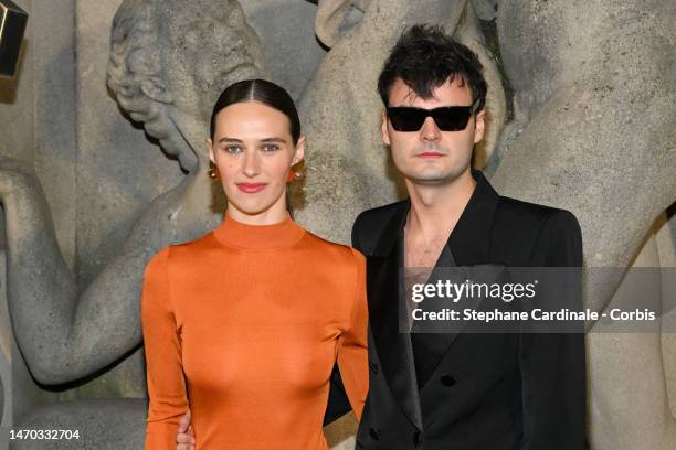 Devon Lee Carlson and Duke Nicholson attends the Saint Laurent Womenswear Fall Winter 2023-2024 show as part of Paris Fashion Week on February 28,...