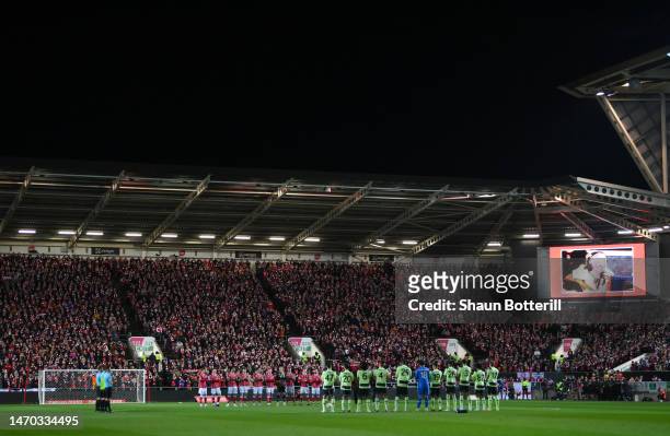 General view of the inside of the stadium as players of Bristol City and Manchester City applaud as a tribute to the late English Football...