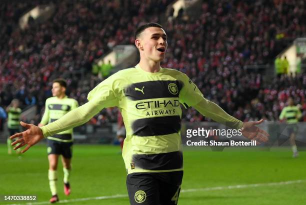 Phil Foden of Manchester City celebrates after scoring the team's second goal during the Emirates FA Cup Fifth Round match between Bristol City and...