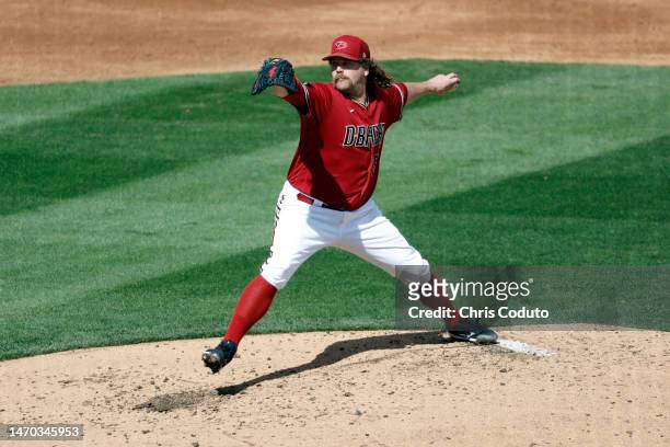Andrew Chafin of the Arizona Diamondbacks throws a pitch during the third inning of a spring training game against the Chicago White Sox at Salt...