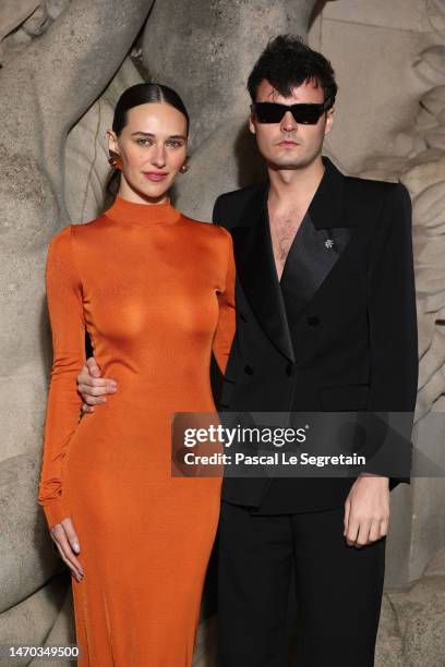 Duke Nicholson, Devon Lee Carlson attend the Saint Laurent Womenswear Fall Winter 2023-2024 show as part of Paris Fashion Week on February 28, 2023...