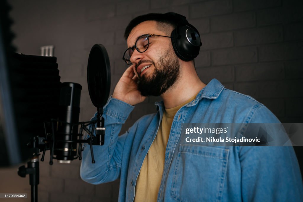 Example Man Singer One Male Singer Singing In A Music Studio High-Res Stock Photo - Getty ...