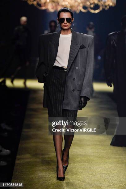 Model walks the runway during the Saint Laurent Ready to Wear Fall/Winter 2023-2024 fashion show as part of the Paris Fashion Week on February 28,...