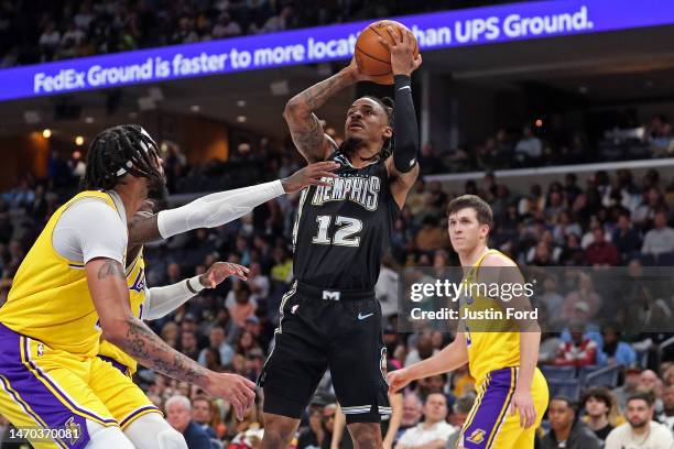 Ja Morant of the Memphis Grizzlies takes a shot during the first half against the Los Angeles Lakers at FedExForum on February 28, 2023 in Memphis,...