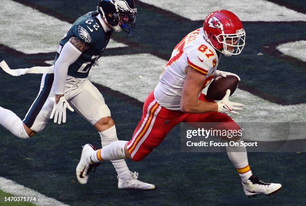 Travis Kelce of the Kansas City Chiefs catches a touchdown pass against the Philadelphia Eagles during the first half in Super Bowl LVII at State...