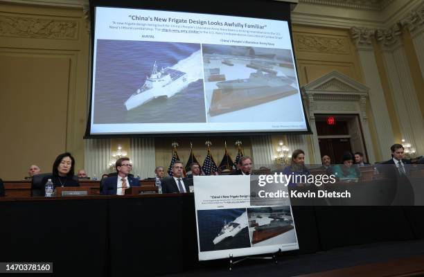 Images of a Chinese frigate and a U.S. Navy combat ship are displayed during a U.S. House Select Committee on Strategic Competition between the...