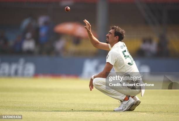 Mitchell Starc of Australia prepares to bowl during day one of the Third Test match in the series between India and Australia at Holkare Cricket...
