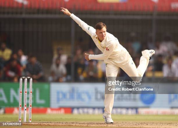 Matthew Kuhnemann of Australia bowls during day one of the Third Test match in the series between India and Australia at Holkare Cricket Stadium on...