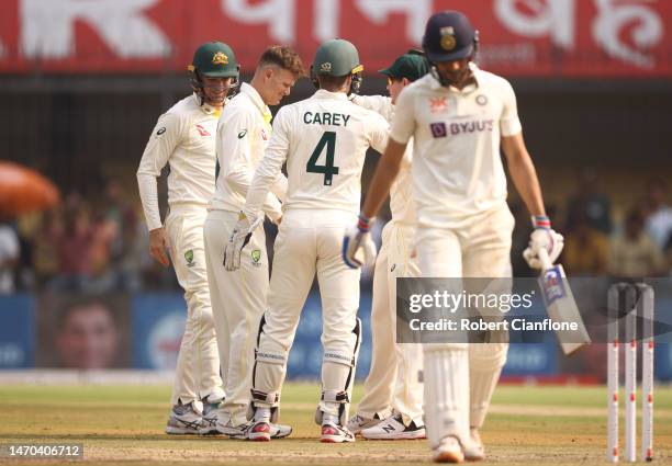 Matthew Kuhnemann of Australia celebrates taking the wicket of Shubman Gill of India during day one of the Third Test match in the series between...