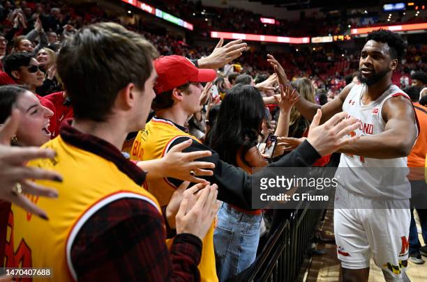 Donta Scott of the Maryland Terrapins celebrates with fans after a victory against the Northwestern Wildcats at Xfinity Center on February 26, 2023...