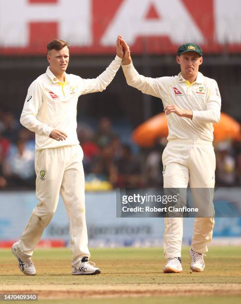 Matthew Kuhnemann of Australia celebrates taking the wicket of Shreyas Iyer of India during day one of the Third Test match in the series between...