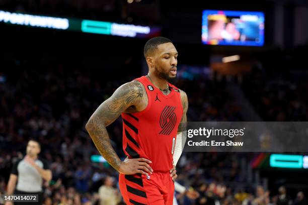 Damian Lillard of the Portland Trail Blazers walks back to the bench during a time out against the Golden State Warriors at Chase Center on February...