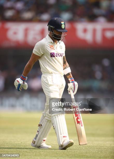 Virat Kohli of India walks off after he was dismissed by Todd Murphy of Australia during day one of the Third Test match in the series between India...