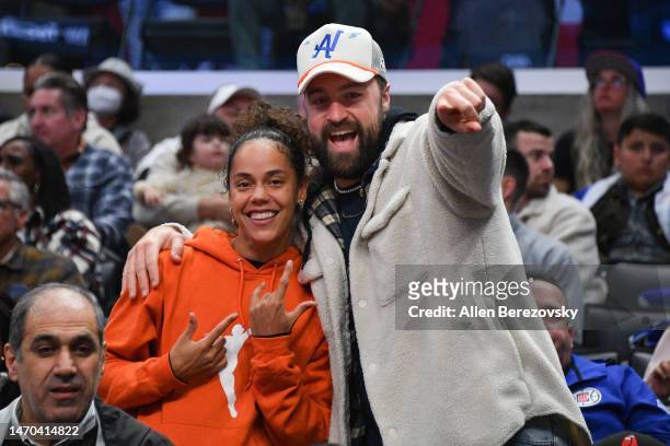 Briana Green and Caleb Nash Feemster attend a basketball game between the Los Angeles Clippers and the Minnesota Timberwolves at Crypto.com Arena on...