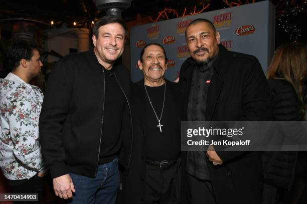 Of Raising Cane's Chicken Fingers Todd Graves, Danny Trejo, and Frankie Loyal attend the Raising Cane's "Secret Sauce With Todd Graves" Premiere on...