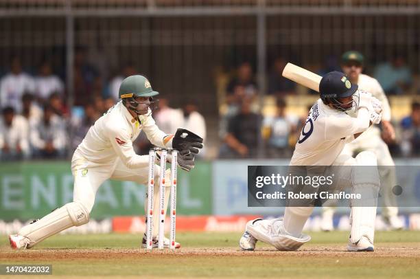 Umesh Yadav of India bats during day one of the Third Test match in the series between India and Australia at Holkare Cricket Stadium on March 01,...