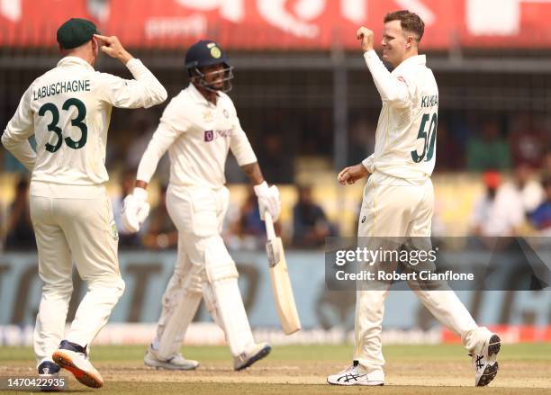 Matthew Kuhnemann of Australia celebrates taking the wicket of Umesh Yadav of India during day one of the Third Test match in the series between...
