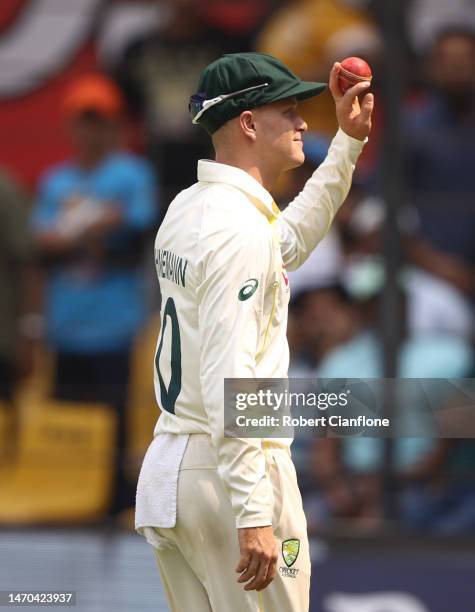 Matthew Kuhnemann of Australia holds up the ball after taking five wickets in the first innings during day one of the Third Test match in the series...