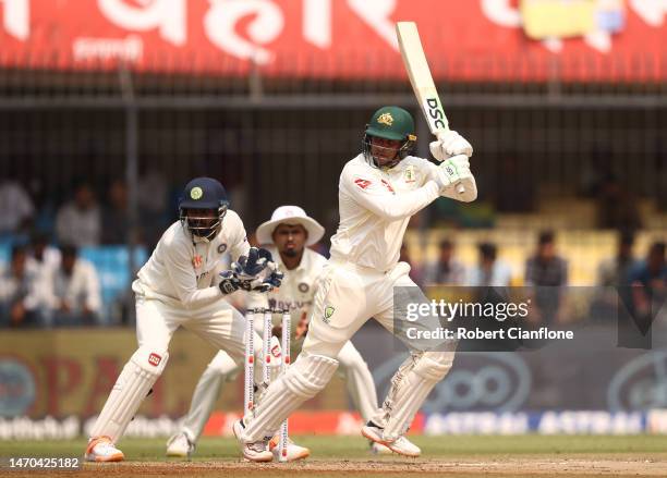 Usman Khawaja of Australia bats during day one of the Third Test match in the series between India and Australia at Holkare Cricket Stadium on March...